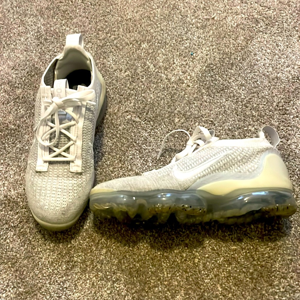 Gray and white Vapormax.